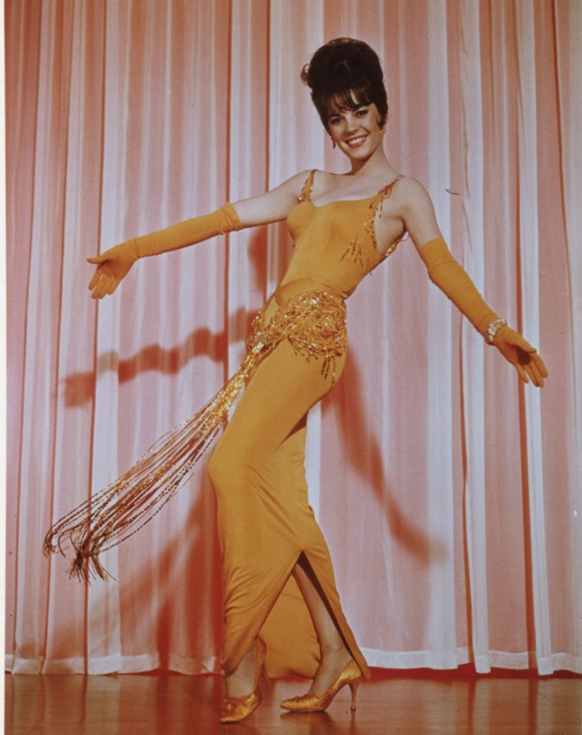 Natalie Wood starred in the classic GYPSY in a costume designed by ORRY-KELLY in a scene from the film WOMEN HE'S UNDRESSED - A FILM BY GILLIAN ARMSTRONG